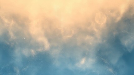 A serene sky filled with soft clouds transitioning from light orange to deep blue, evoking a peaceful and tranquil atmosphere.