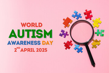 Autism Day, magnifying glass and colorful puzzles on a pink background, with text, top view