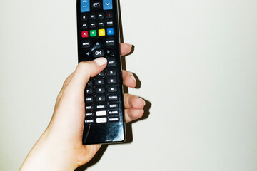 Pov/point of view of person switching on and watching tv television 