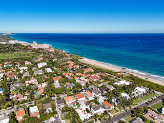 Luxury homes and apartments near Worth Ave with the Breakers Hotel in the background on Palm Beach in Palm Beach County, Florida