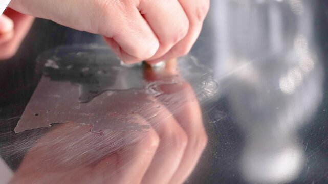 Hand Cleaning Glass Surface