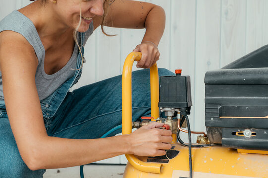 Builder repairing equipment in an LGBTQ affirming space