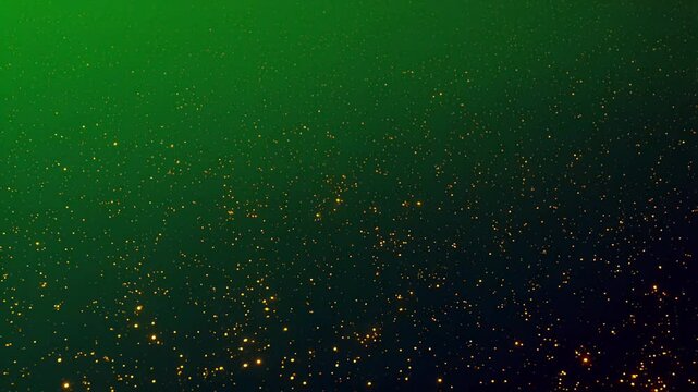 Abstract green background with sparkling golden particles
