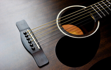 Fototapeta premium acoustic guitar on black background