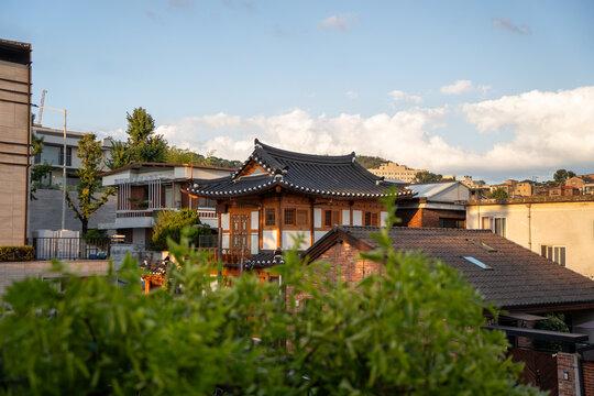 Traditional Korean house surrounded by regular buildings