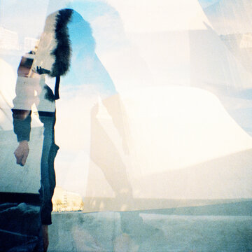 Double Exposure Snow Man with Winter Coat 