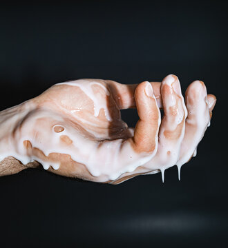 Male Hand In Liquid Soap Shovel Gel Close-up