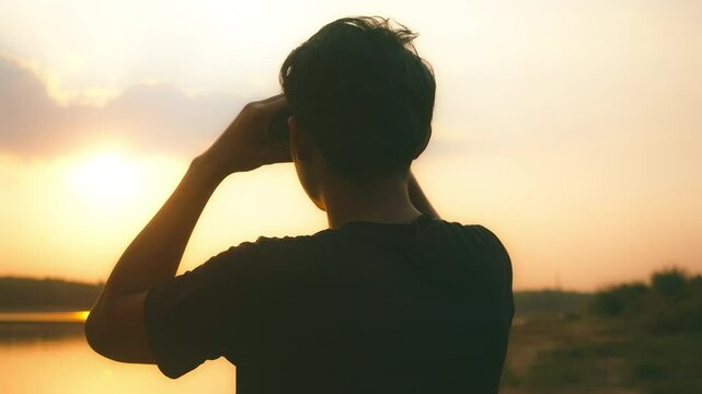 man use the binoculars.Concept perspective for future planning vision for success ideas.