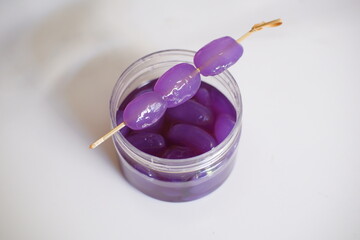 Sugar palm fruit candy in glass jar