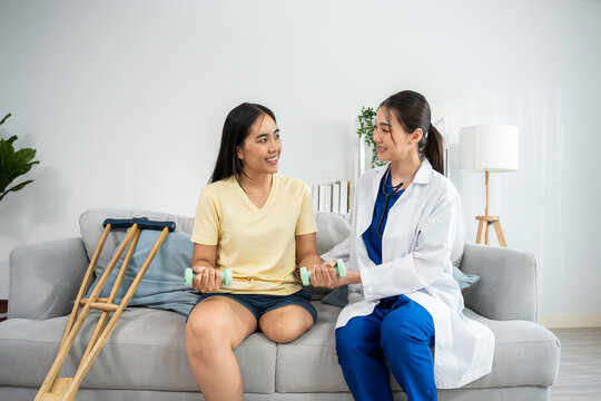 Asian caregiver psychology doctor examine and listen to female amputee.  - Powered by Adobe