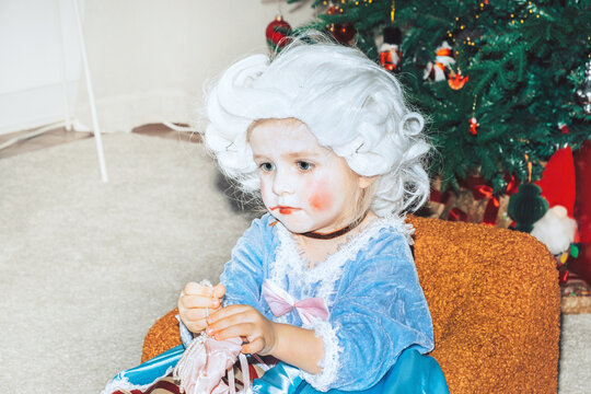 Princess sitting in living room 