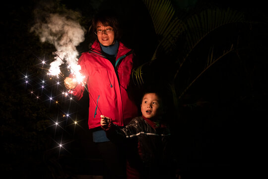 Happy Family Winter Night Sparkler Celebration