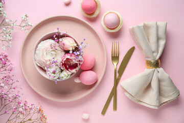Stylish table setting for Easter celebration with different flowers on pink background