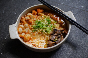 Bowl of spicy noodles soup 