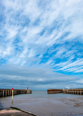 Lighthouse on the pier in a traditional English village