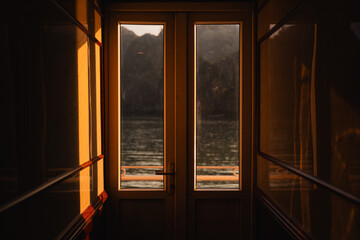 Seascape looked through a window door.