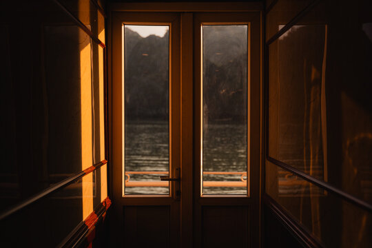 Fototapeta Seascape looked through a window door.