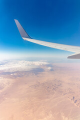 Obraz premium Aerial view on arabian desert and Red sea mountains from airplane