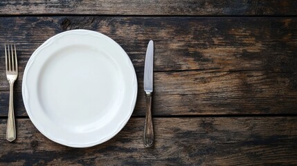 Simple Table Setting with Empty White Plate
