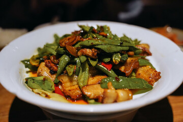 Chinese food Twice-cooked pork served on a plate