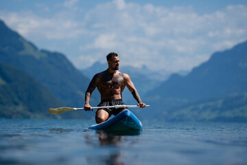 Sexy summer man. Muscular body. Hot summer. Nude sexy male body. Guy splash in water in summer...