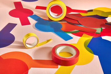 Still life with tapes and colorful photo filters on pink background