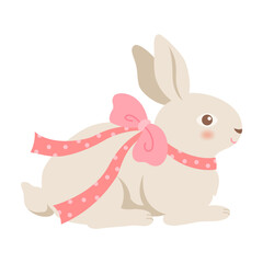 Rabbit sitting with pink ribbon on white background.