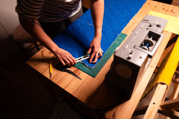 Cutting Blue Quilted Fabric with Rotary Tool