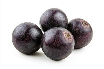 Grouping of Fresh Plump Black Fruits Displaying their Skin Texture on Clean White Table Background