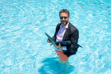 Funny businessman. Business success. Funny office worker online work, e-working. Fun business....