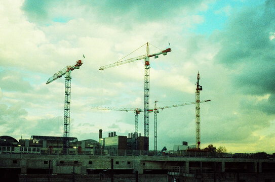 Cranes under in an urban area