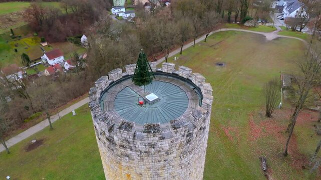 Aerial view of Heinrichsturm in Bad Abbach, Bavaria, Germany. This medieval tower surrounded by scenic Bavarian hills, Danube River and countryside, offers breathtaking views and historical heritage. 