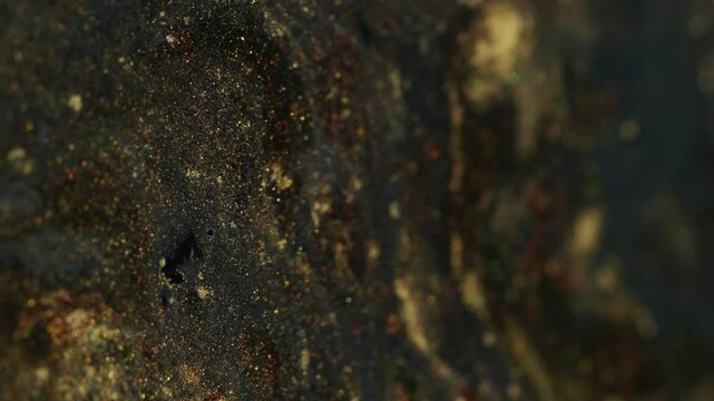 Sparkling wave. Glitter floods. Shiny metal dust in liquid wet glow of brilliant powder whimsical overlay copper stream. Changeable art mix decorative luxury background.