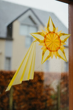 bright yellow star paper art for Three Kings Celebration