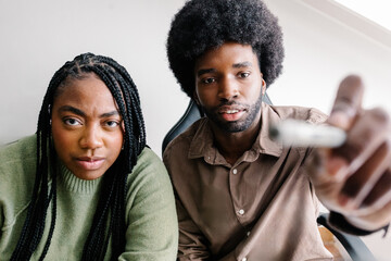 POV of workers attending a video call while point directly at camera