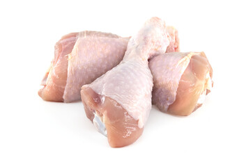 Fresh raw chicken drumsticks isolated on white background