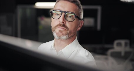 Thinking, drawing and night with man, creativity and architecture with industry. Evening, person and employee with ideas, modern office and deadline with engineering, decision and problem solving