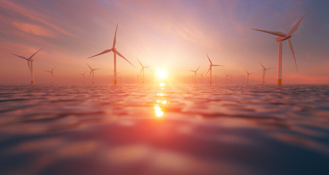 Wind turbine Park in the ocean at sunset