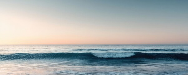 Obraz premium Seascape abstract background concept. Serene ocean waves gently lap against the shore during sunset, showcasing nature's beauty.