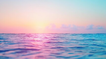 Obraz premium Seascape abstract background concept. A serene ocean view at sunset with vibrant colors reflecting on the water's surface.