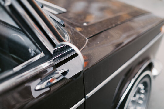 Part of retro car outdoors