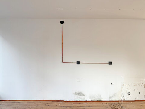 white wall with pipe