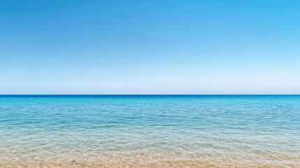 Obraz premium Seascape abstract background concept. A tranquil seascape capturing calm waters under a clear blue sky, perfect for relaxation.