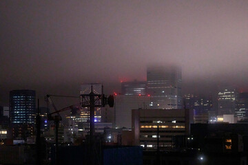 Mystical cityscape of Tokyo shrouded in fog
