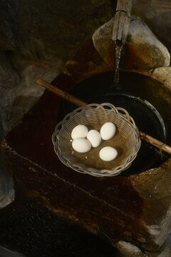 Warm springs cradle delicate onset eggs as steam rises 