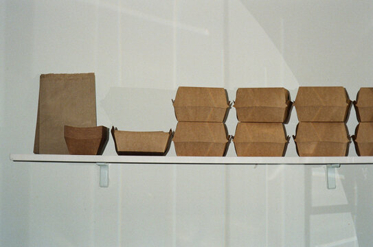 Unique packaging options displayed in a small cafe