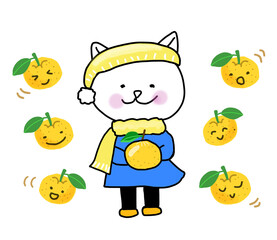 冬にゆずに囲まれている白ネコ