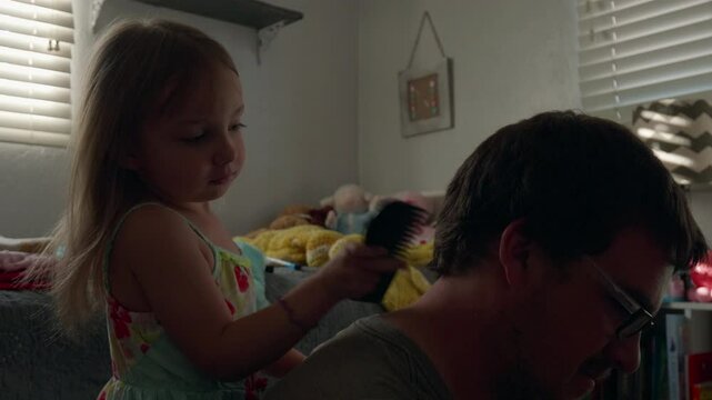 Daughter Combing Her Dads Hair