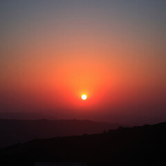 Fototapeta premium Breathtaking sunset over a tranquil landscape