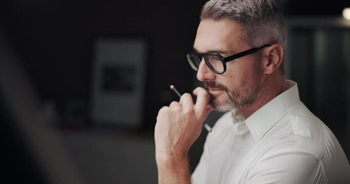 Business, drawing and night with man, thinking and architecture with industry. Evening, person and employee with ideas, illustration and deadline with problem solving, solution and decision in office